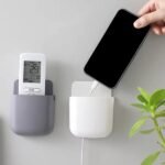 1-pcs-u-shape-wall-mounted-mobile-and-remote-holder-wall-mounted-storage-case-for-remote-toothbrush-mobile-phone-plug-holder-multifunctional-storage-holder-random-color – 1