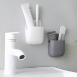 1-pcs-u-shape-wall-mounted-mobile-and-remote-holder-wall-mounted-storage-case-for-remote-toothbrush-mobile-phone-plug-holder-multifunctional-storage-holder-random-color – 1